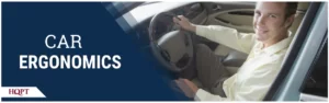 Man sitting in his car holding a steering wheel